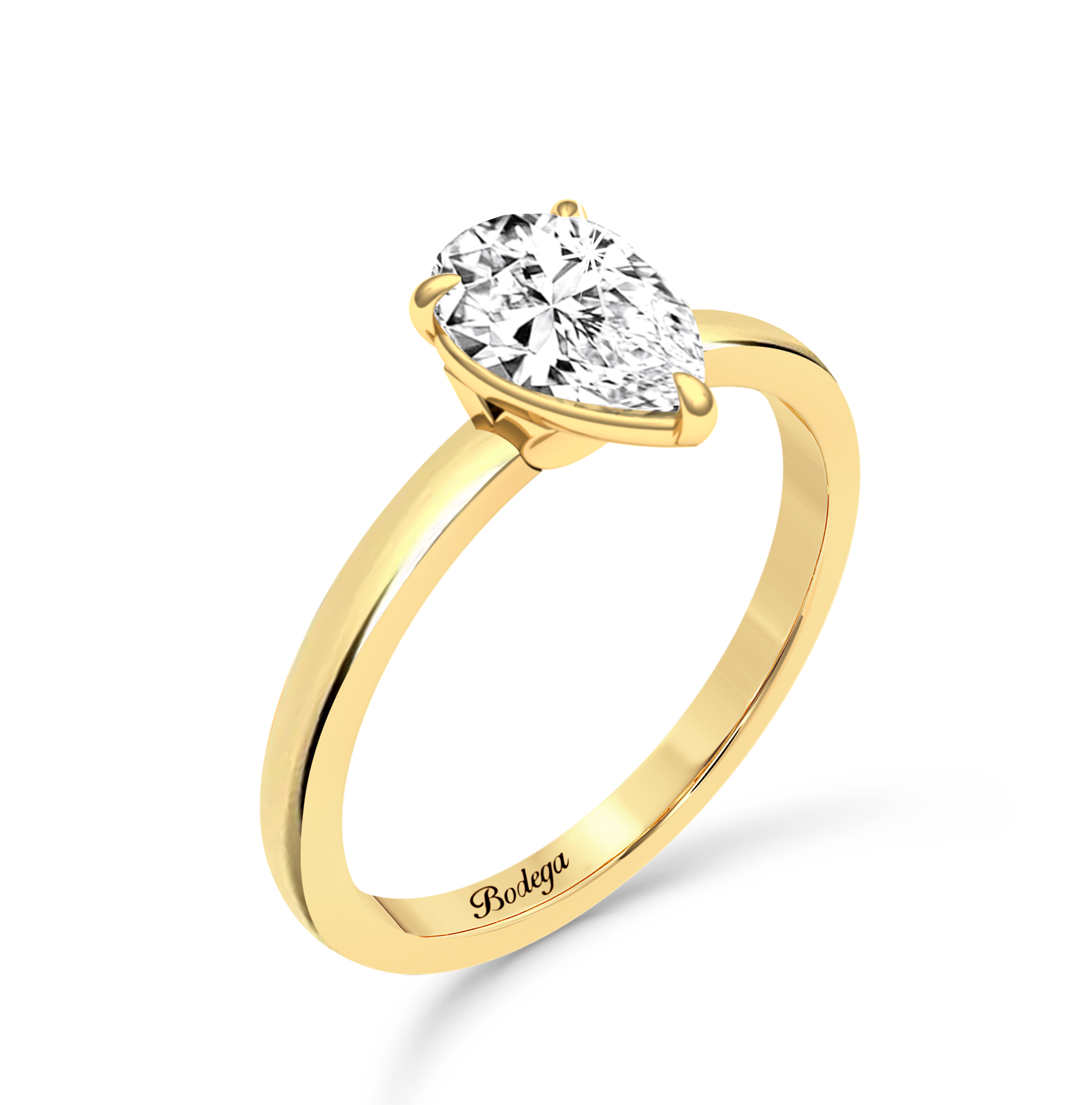 Pear Cut Solitaire Ring in flush setting - Yellow Gold - Bodega